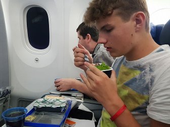 Quentin has lunch in the plane